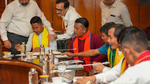 Members of the Dimasa National Liberation Army during the signing of a Memorandum of Understanding between the outfit and the Government of Assam in New Delhi