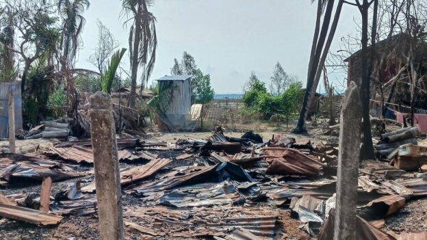 Destroyed house and burned trees following fighting between Myanmar’s military and the Arakan Army (AA) ethnic minority armed group in the Rakhine State. (Photo Credit: AFP)